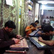 A group of craftsmen working in a metalworking workshop in Esfehan